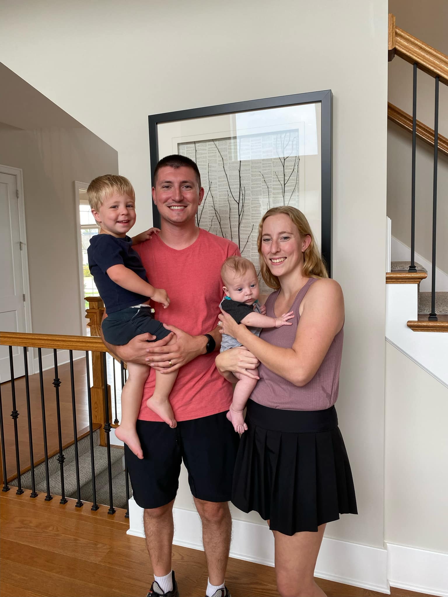 Family picture of Ethan, his wife and two sons
